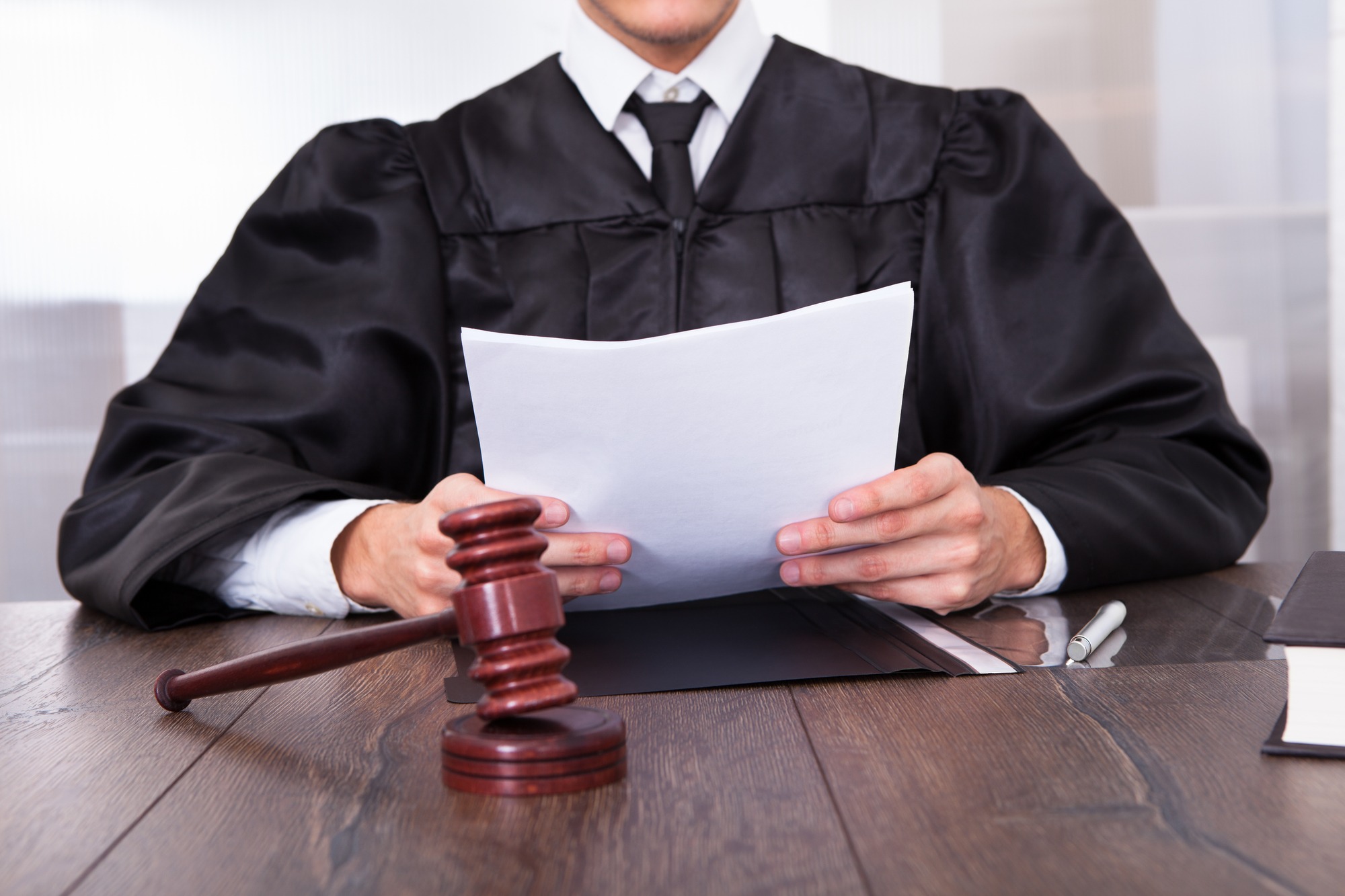 Judge Holding Documents You be the judge