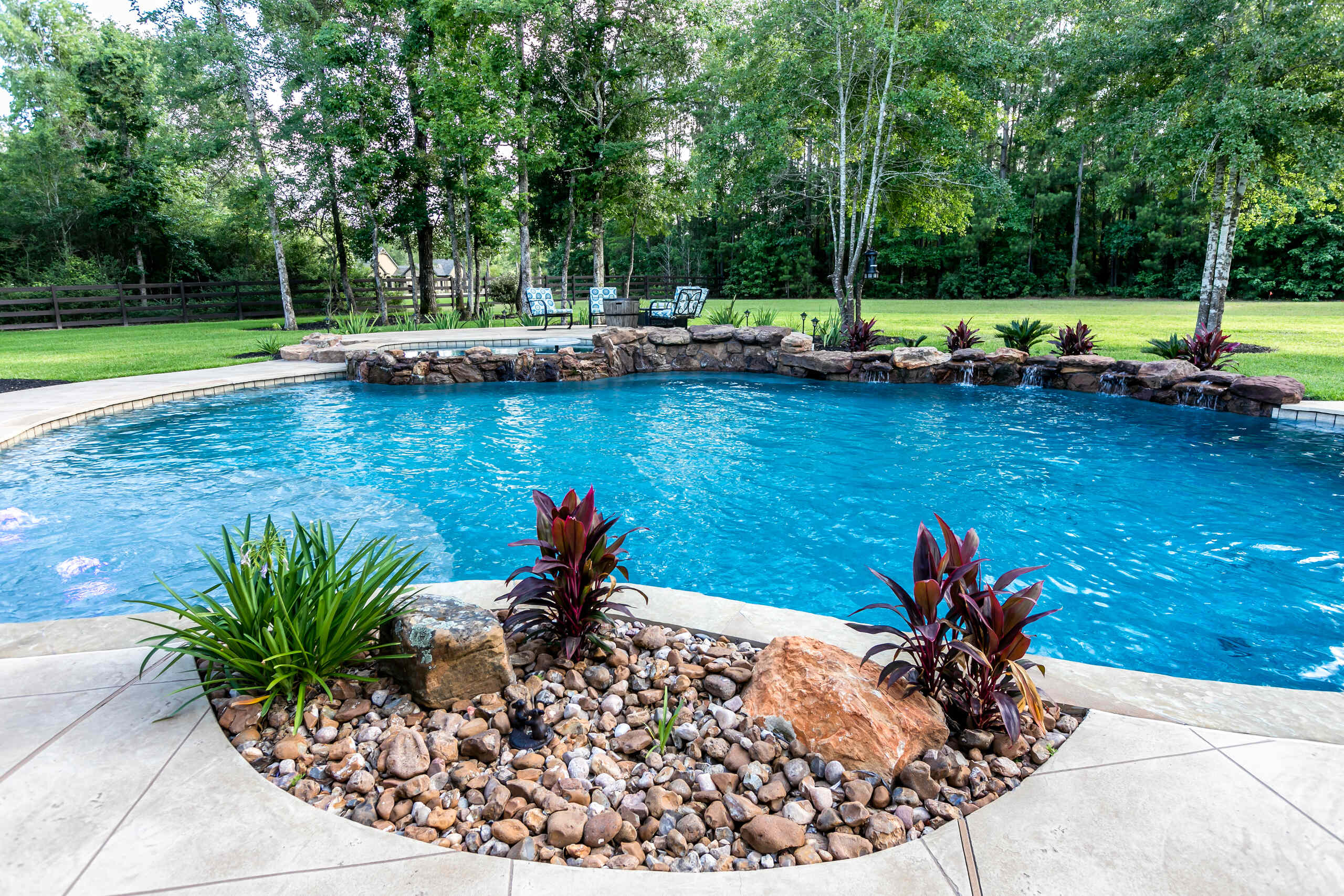 Freeform Pool with Stone Waterfall in High Meadow Ranch TX
