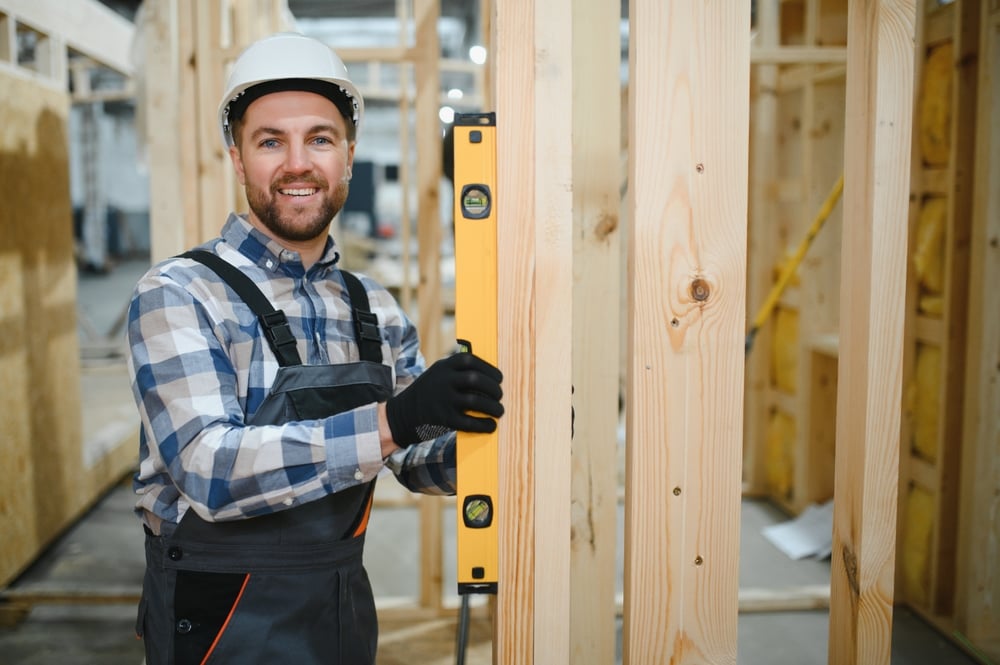 Modern,Modular,House.,A,Worker,Works,On,The,Construction,Of home builder